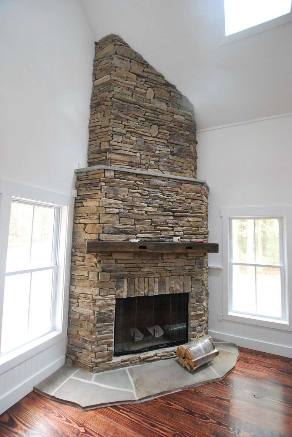 corner rock  Corner stone fireplace, Fireplace remodel, Corner