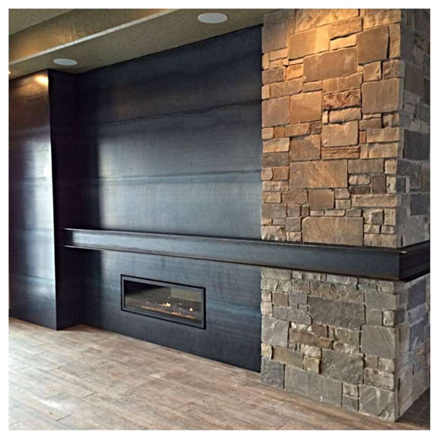 Finished product! Hot roll steel & stone fireplace and integrated