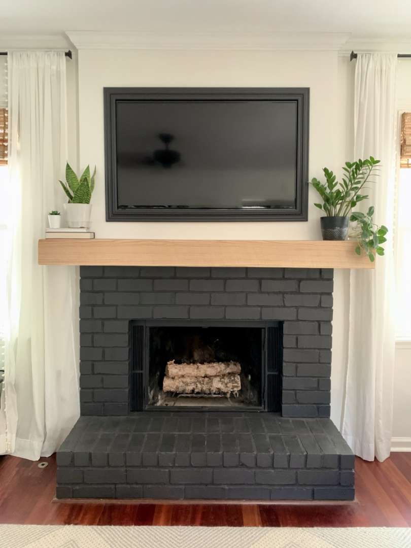 How I Painted My Brick Fireplace Black in  Easy Steps - Dengarden