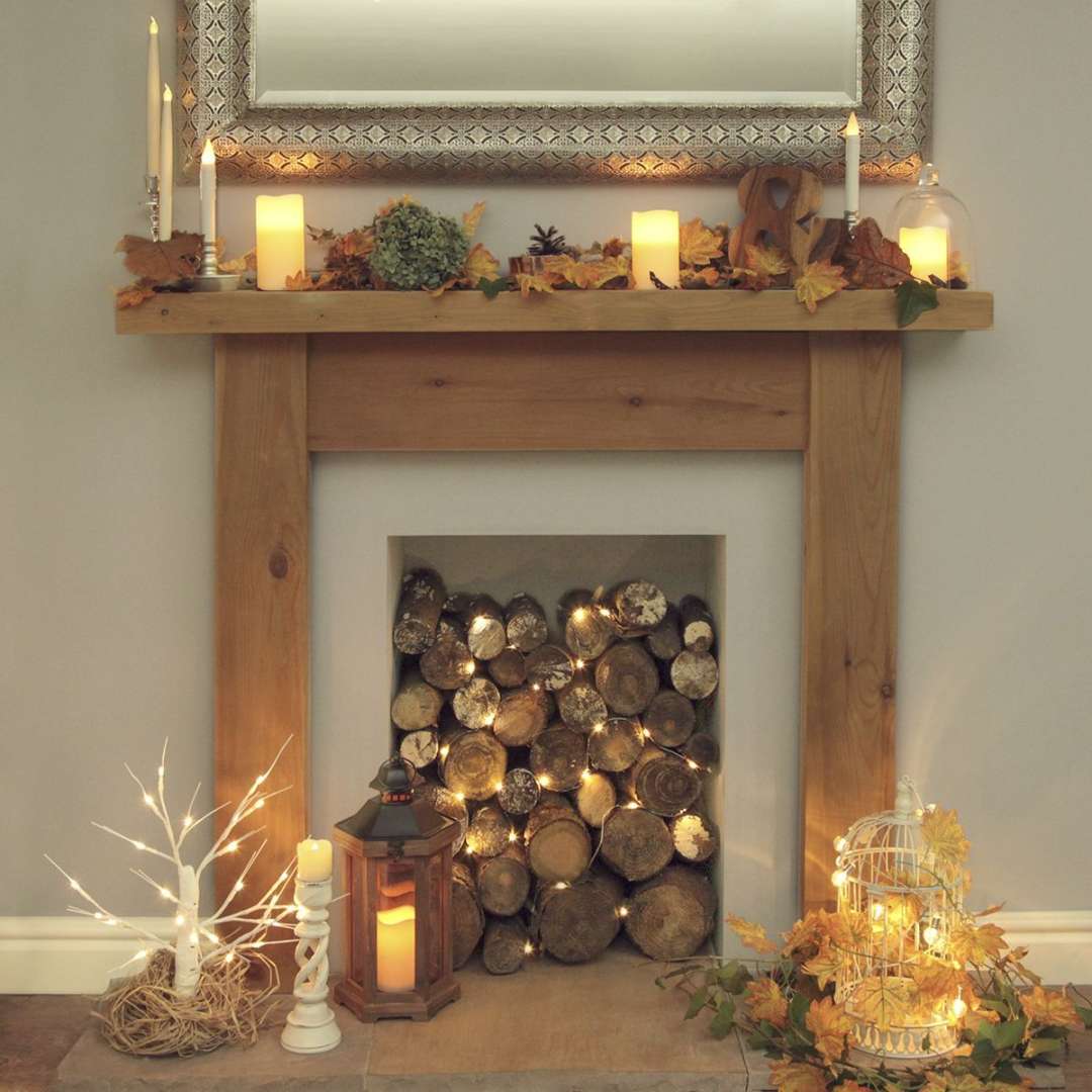 Logs & Fairy-lights Inside  Candles in fireplace, Living room