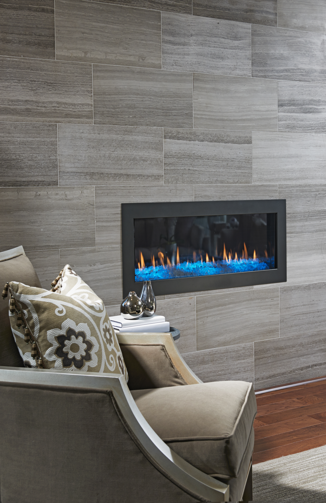 Love the floor-to-ceiling tile surround on this fireplace in the