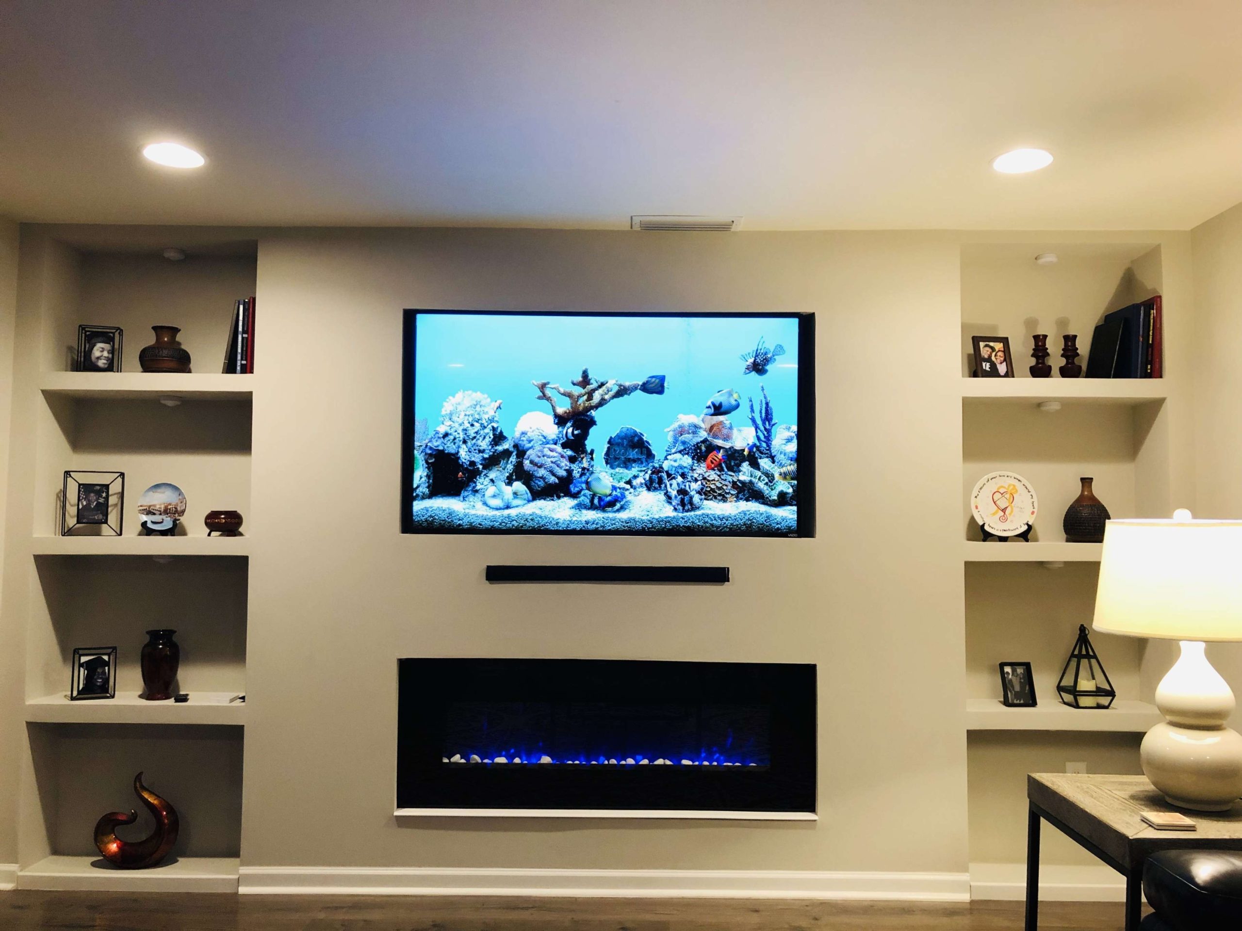 Love this look of my new built in wall unit with TV over fireplace