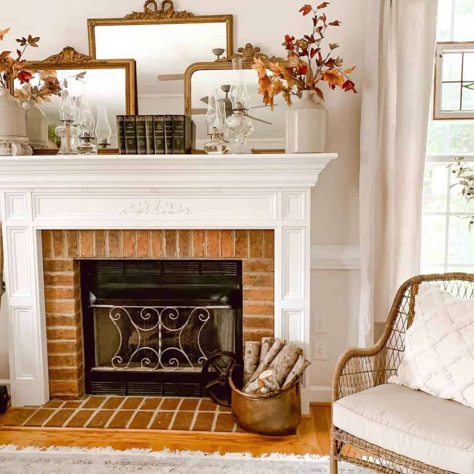 Red Brick Fireplace With Layered Mirrors - Soul & Lane