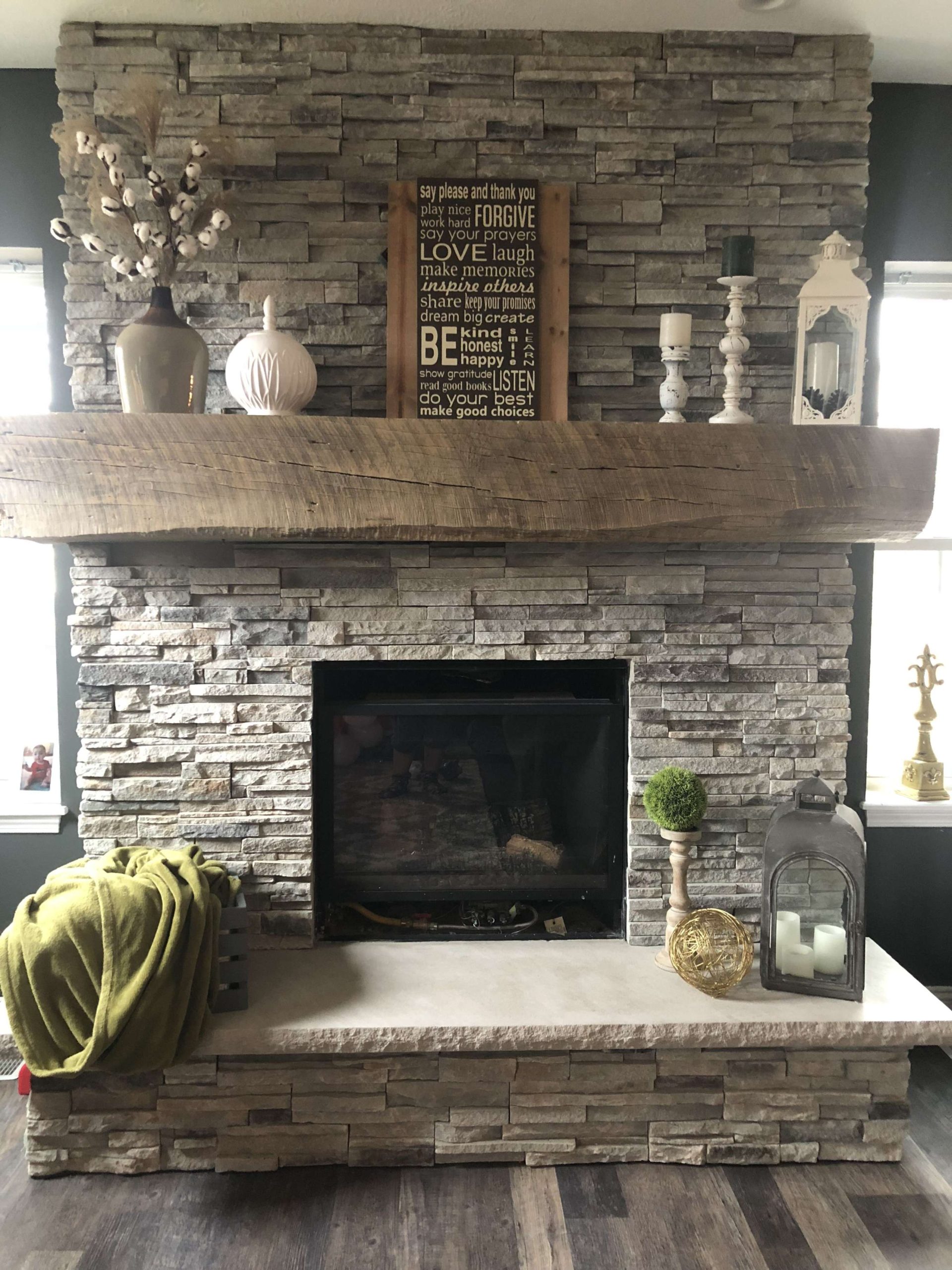 Stone fireplace with barn mantle  Farmhouse fireplace decor