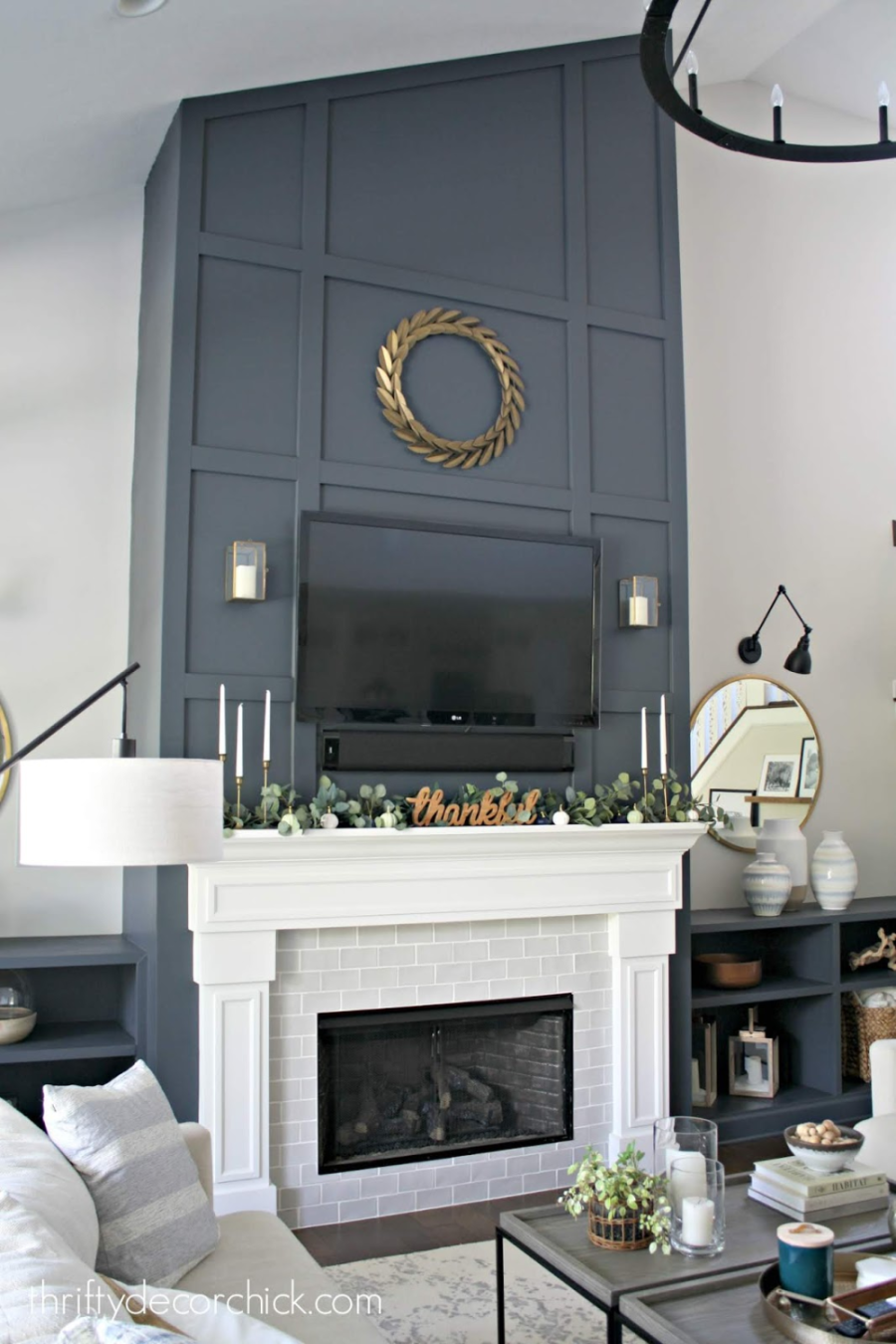 Dramatic Fireplace Wall Makeover with Molding and Paint